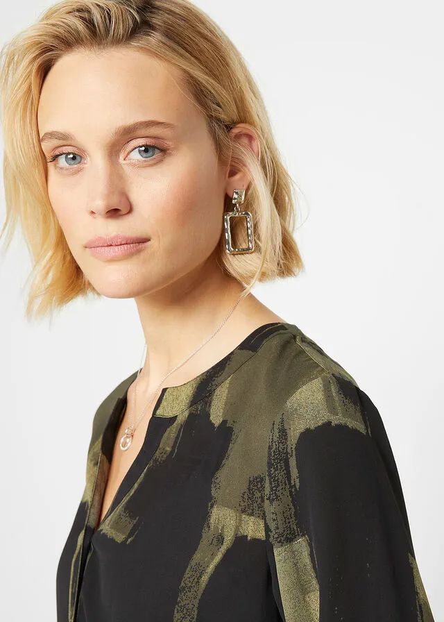 BLUSA LARGA CON ESTAMPADO NEGROVERDE OLIVA