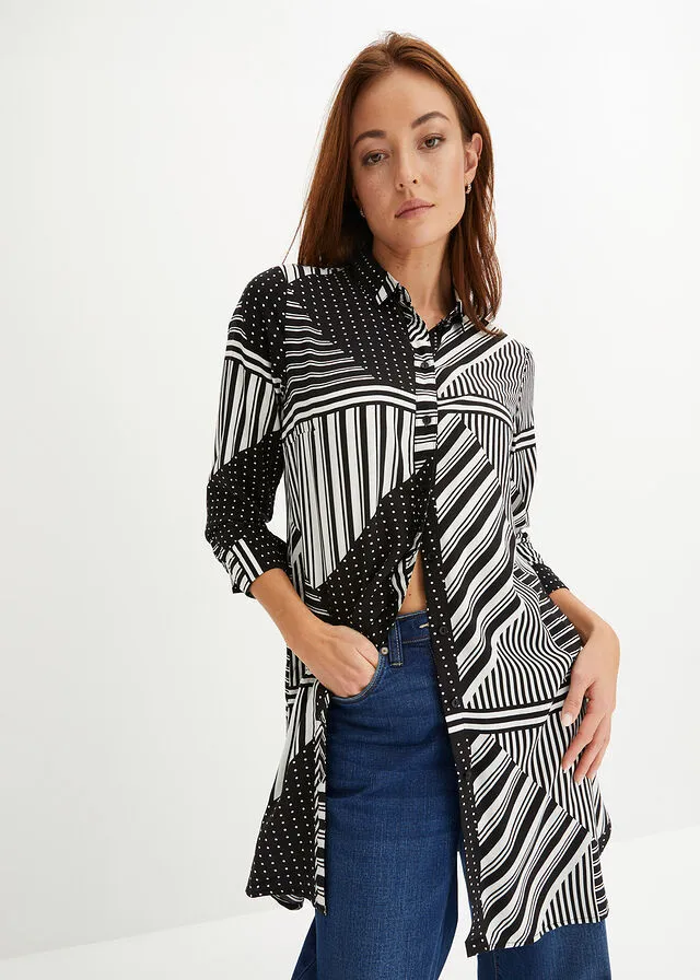 BLUSA LARGA NEGROBLANCO CON ESTAMPADO GRáFICO