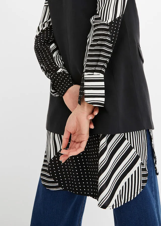 BLUSA LARGA NEGROBLANCO CON ESTAMPADO GRáFICO