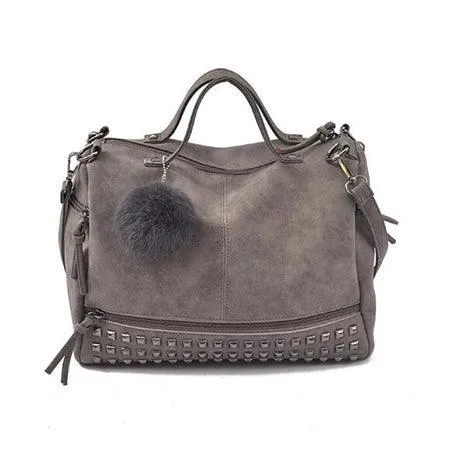 Bolso de cuero con remaches vintage