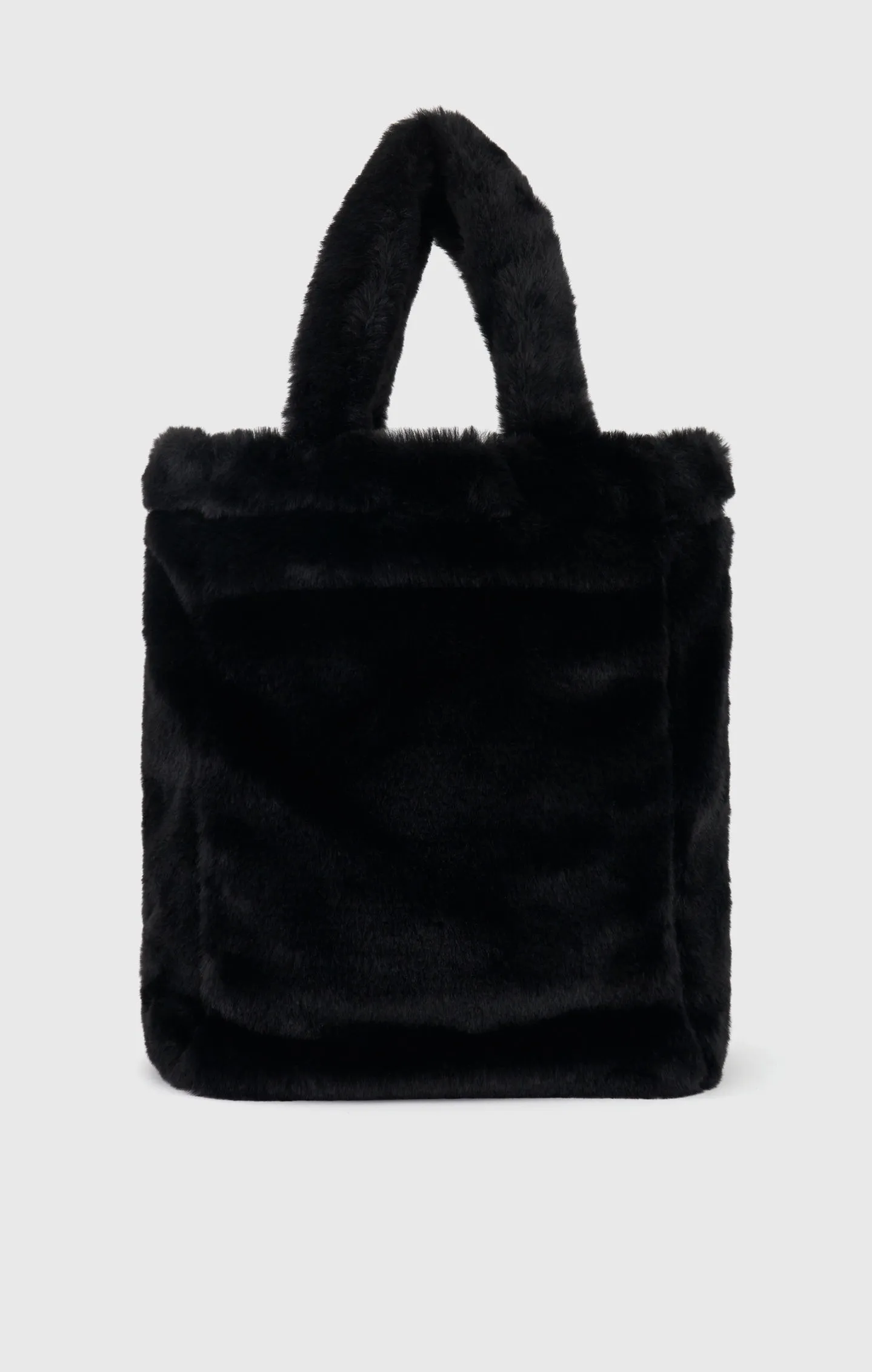 Bolso de pelo falso con etiqueta de jacquard