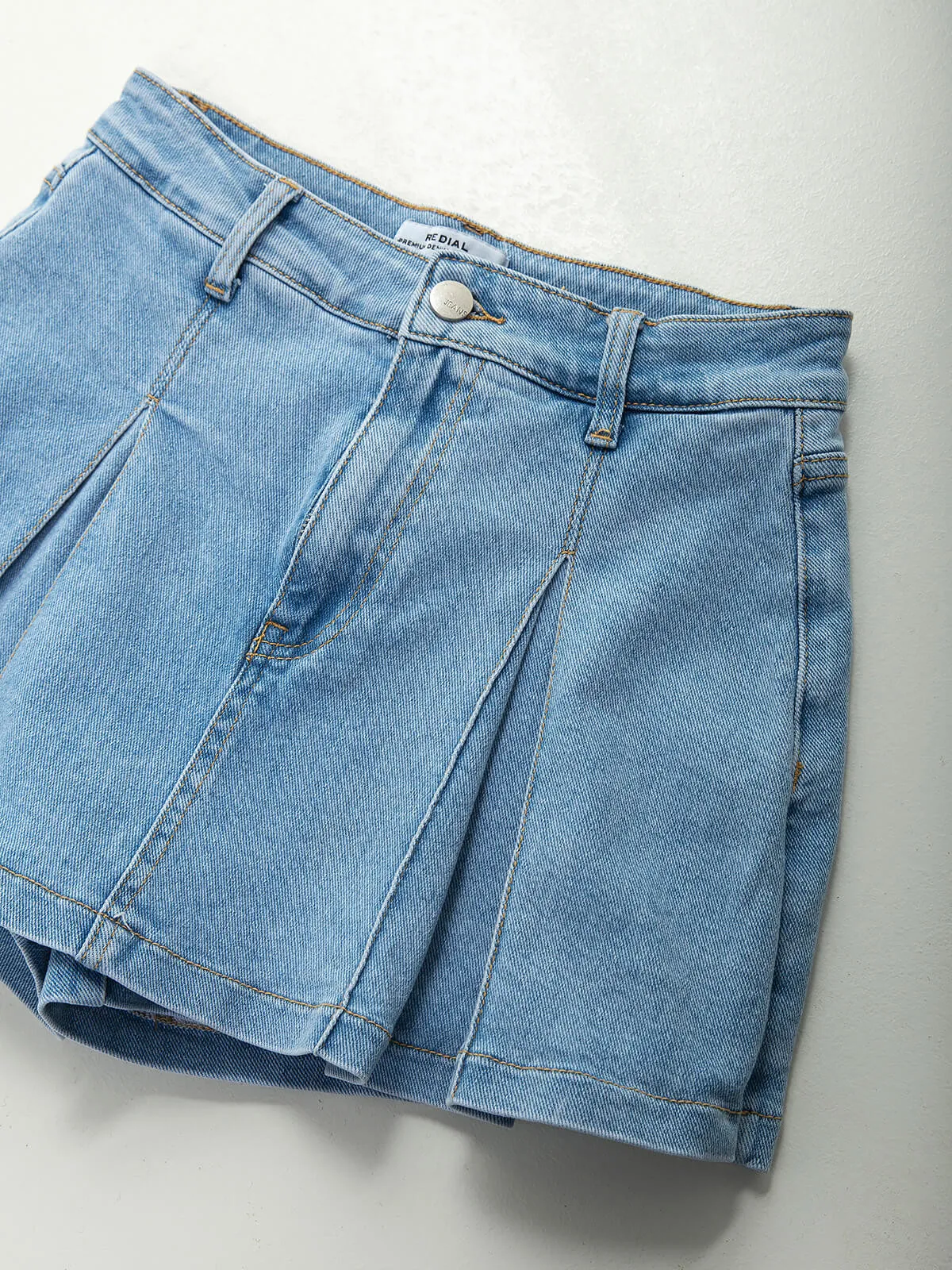 FALDASHORT VAQUERA CON PLIEGUES