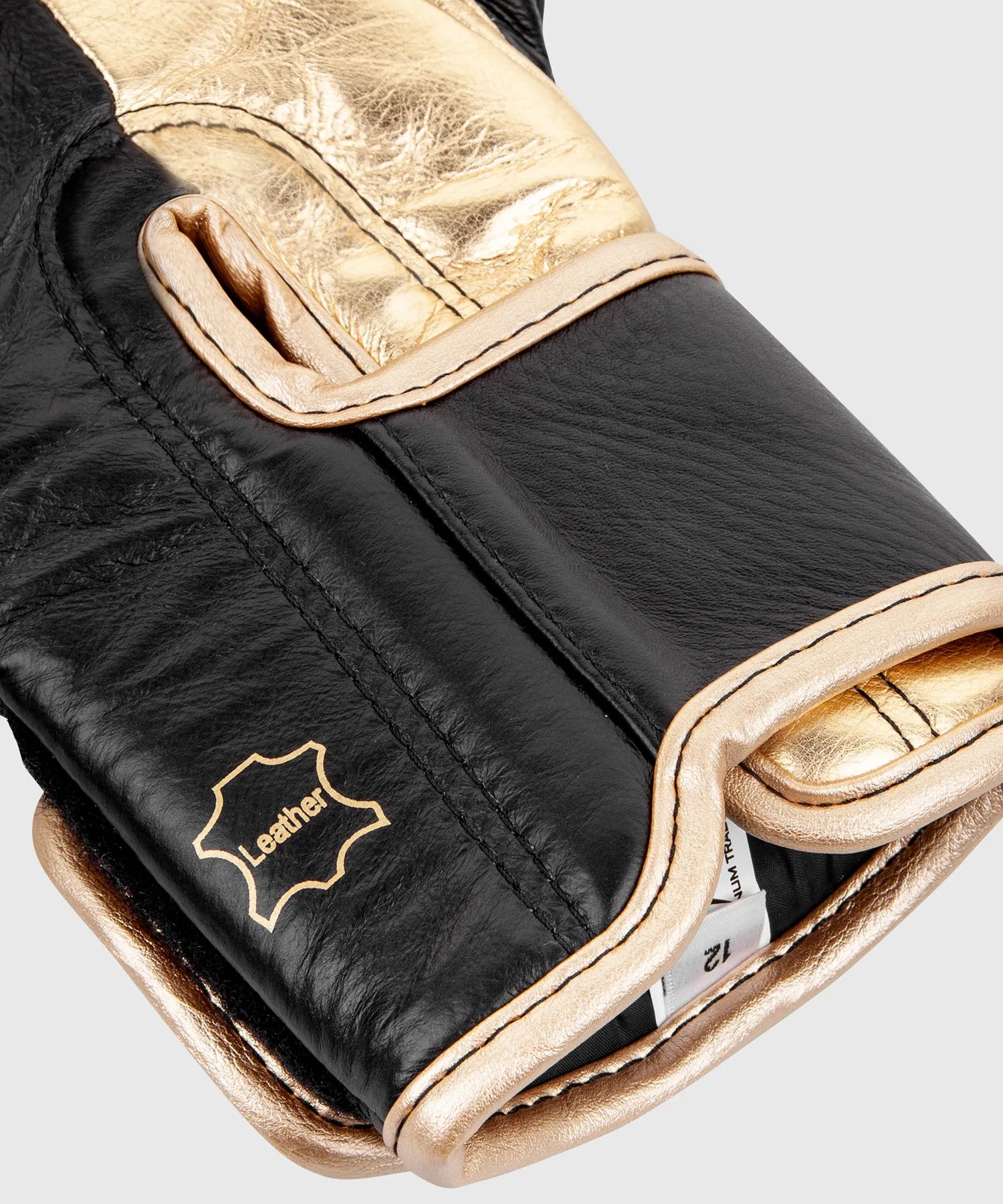 GUANTES DE BOXEO PROFESIONAL VENUM HAMMER – VELCRO  NEGRO/ORO