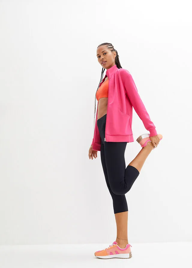 Leggings deportivos moldeadores con bolsillos, largo 3/4 Negro