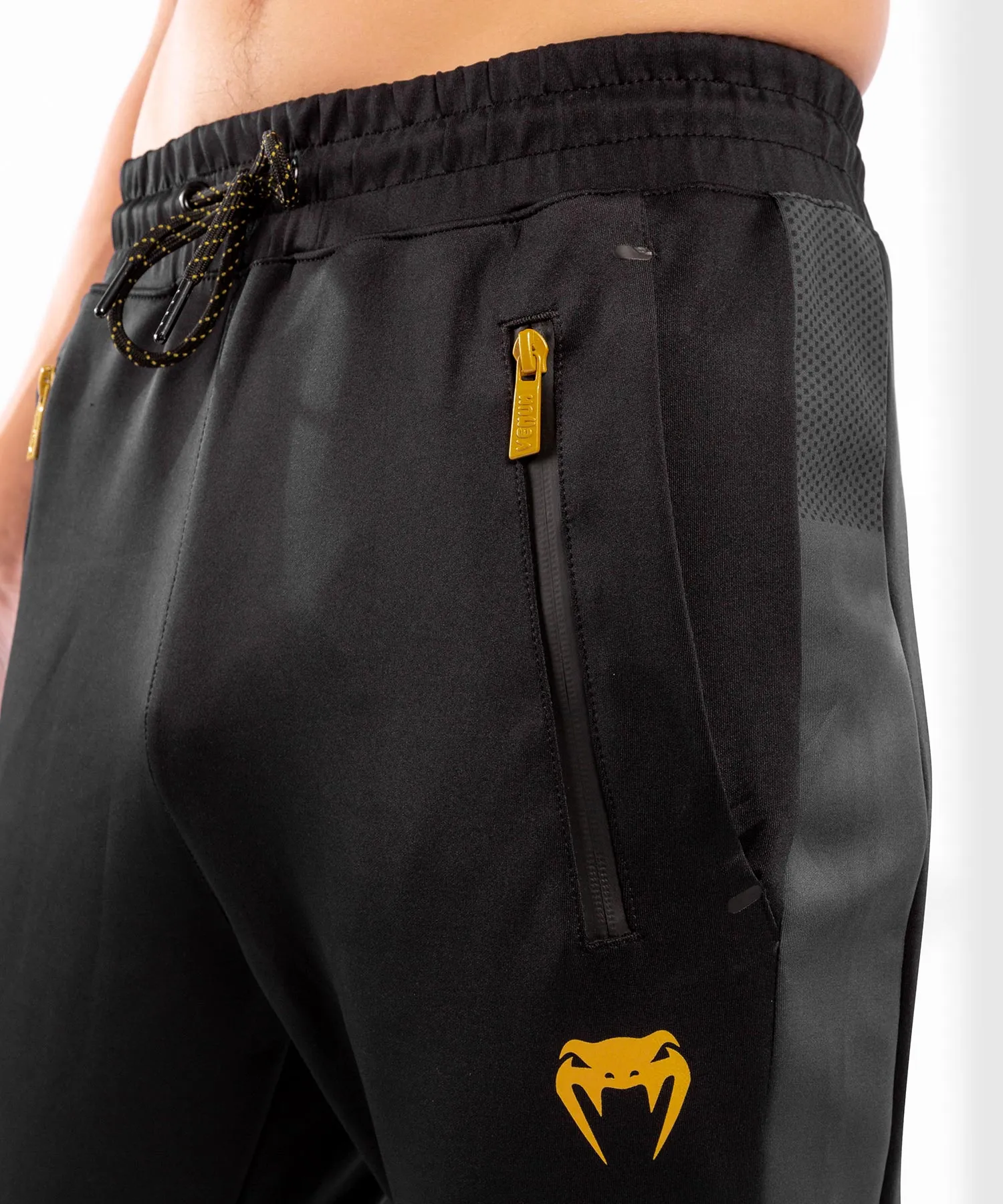 PANTALONES DE CHáNDAL VENUM ATHLETICS  NEGRO/DORADO