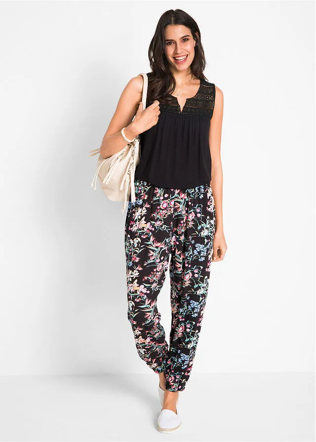 Pantalón bombacho de viscosa sostenible con cintura cómoda Negro con flores