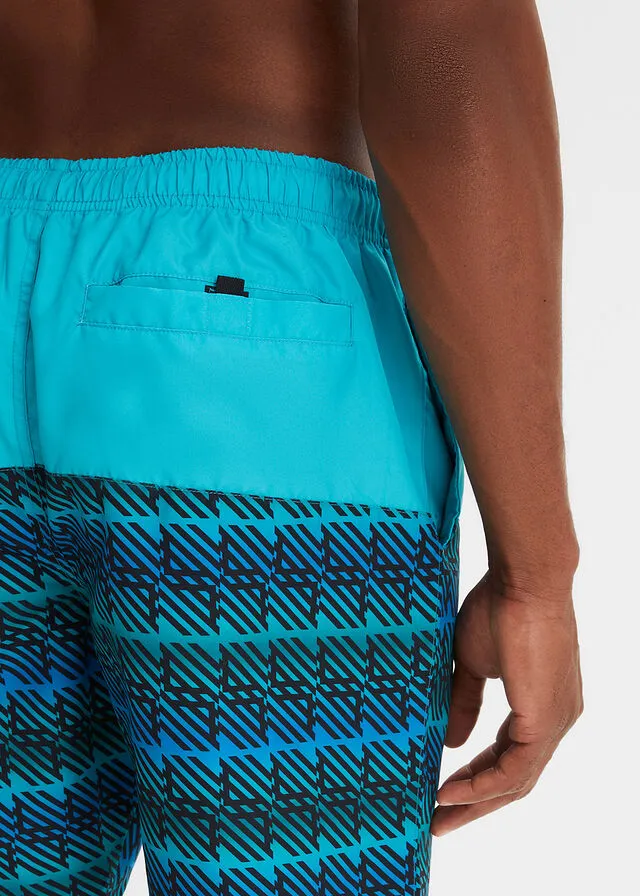 PANTALóN CORTO DE PLAYA TURQUESANEGRO CON ESTAMPADO GRáFICO