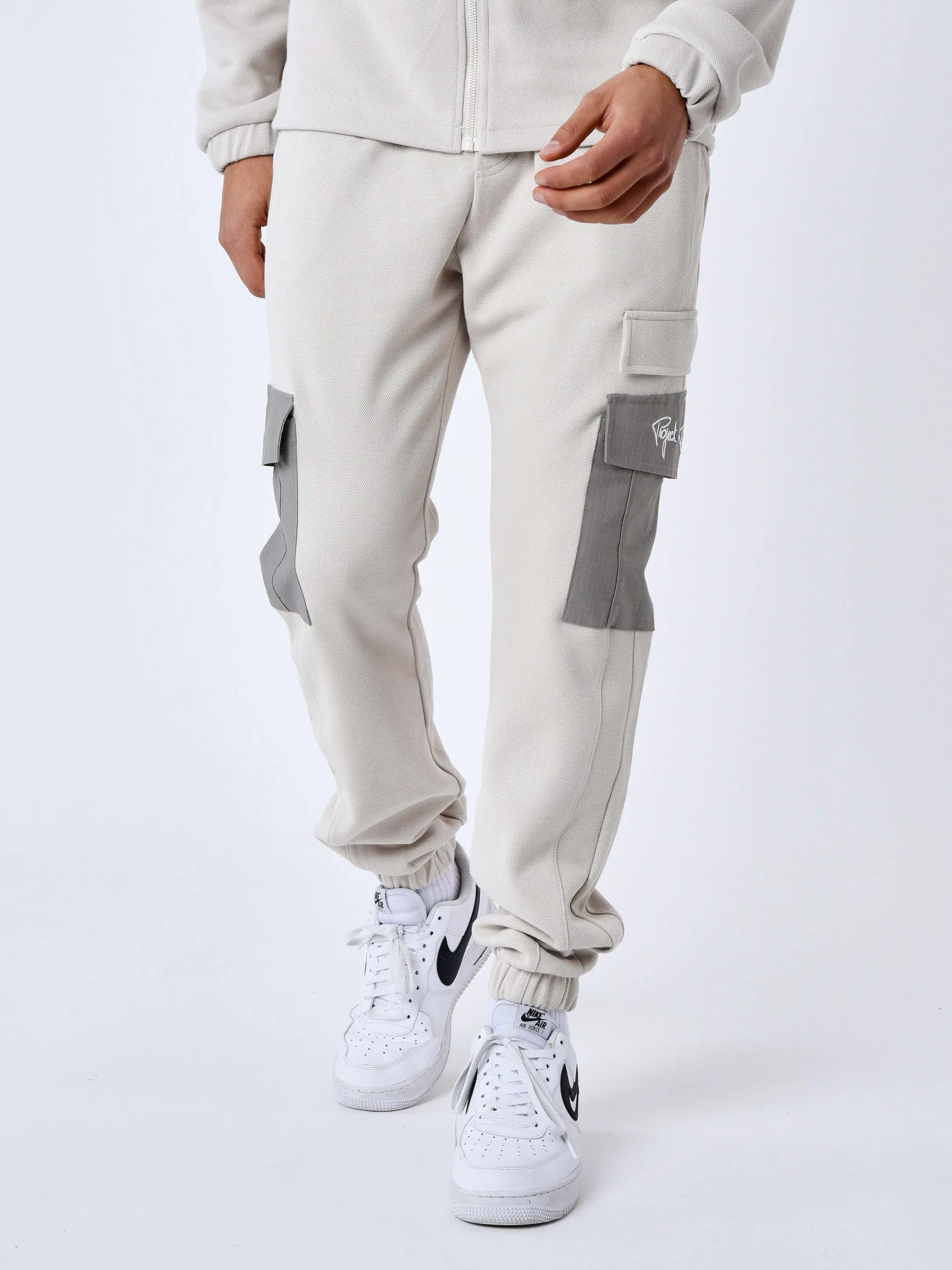 Pantalón de chándal de dos piezas con bolsillos