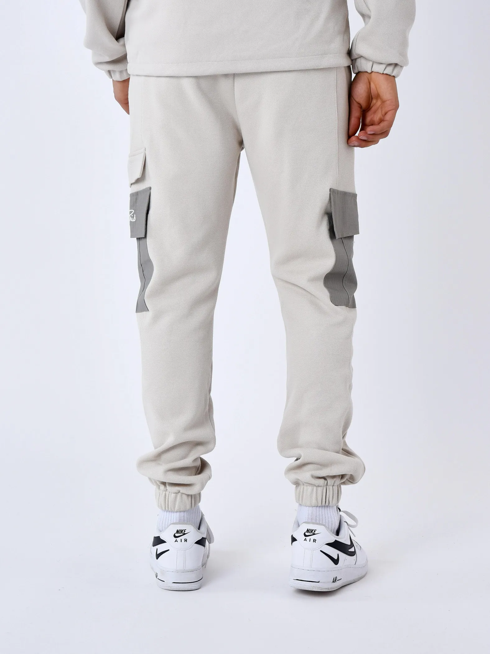 Pantalón de chándal de dos piezas con bolsillos