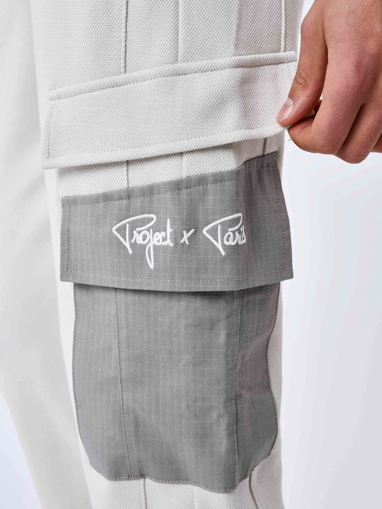Pantalón de chándal de dos piezas con bolsillos
