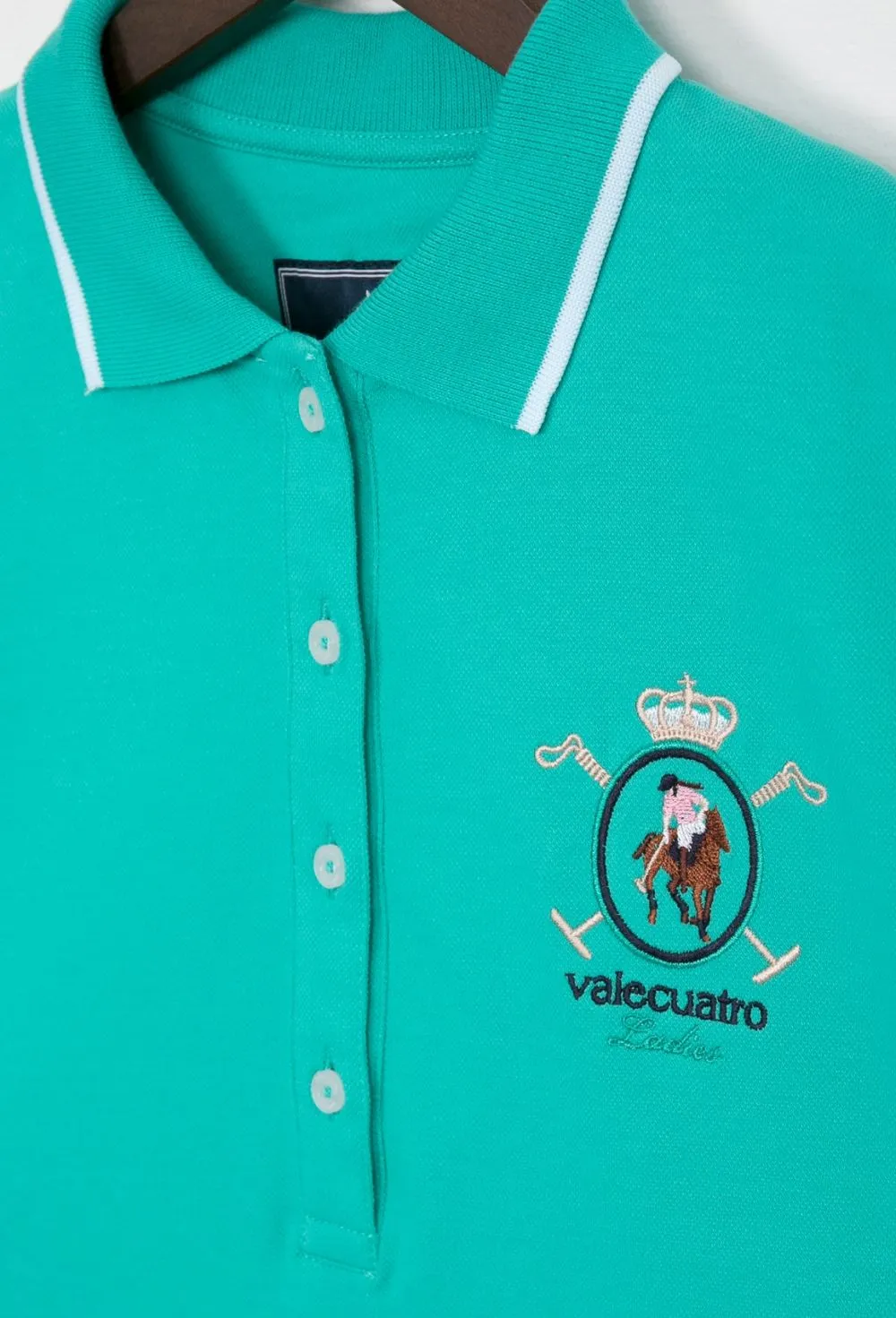 Polo clásico verde escudo Valecuatro de mujer