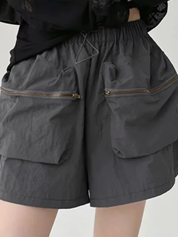 Shorts sueltos con cordón y cintura elástica con bolsillo grande
