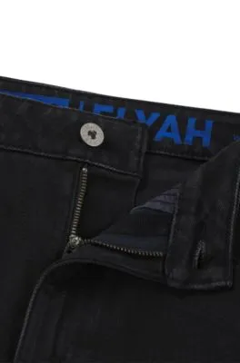 Vaqueros de corte recto en denim elástico negro