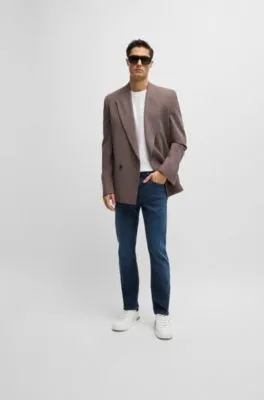 Vaqueros Delaware slim fit en denim elástico de punto azul