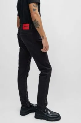 Vaqueros extra slim fit de denim elástico negro de gran comodidad