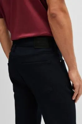 Vaqueros Porsche x BOSS tapered fit de tejido denim técnico azul oscuro
