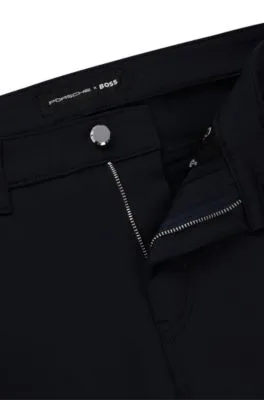 Vaqueros Porsche x BOSS tapered fit de tejido denim técnico azul oscuro
