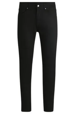 Vaqueros Porsche x BOSS tapered fit en denim negro de altas prestaciones