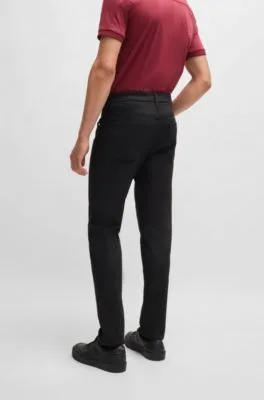 Vaqueros Porsche x BOSS tapered fit en denim negro de altas prestaciones
