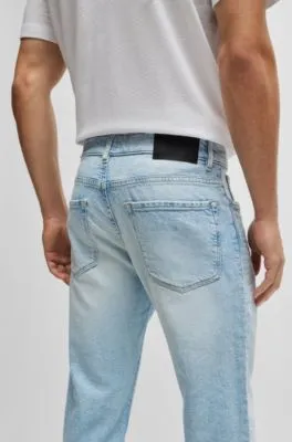 Vaqueros regular fit de tejido vaquero elástico azul con estirado mecánico