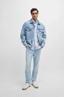 Vaqueros regular fit de tejido vaquero elástico azul con estirado mecánico