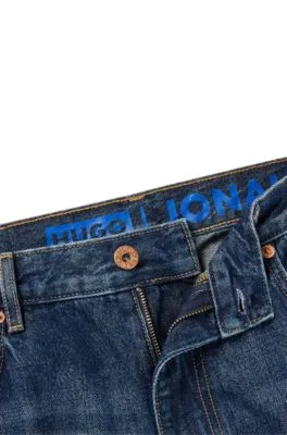 Vaqueros regular fit en denim azul marino lavado a la piedra