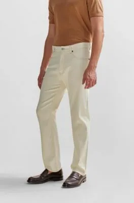 Vaqueros regular fit en denim crudo de gran comodidad