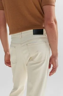 Vaqueros regular fit en denim crudo de gran comodidad