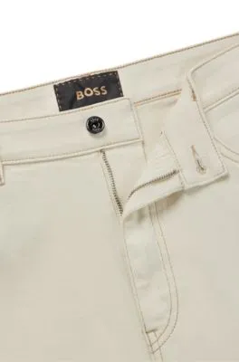Vaqueros regular fit en denim crudo de gran comodidad