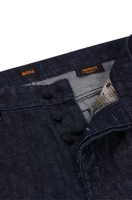 Vaqueros relaxed fit en denim rígido azul con efecto arrugado