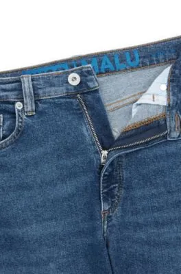Vaqueros skinny fit de denim elástico azul medio
