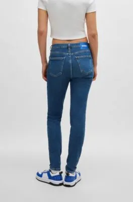 Vaqueros skinny fit de denim elástico azul medio