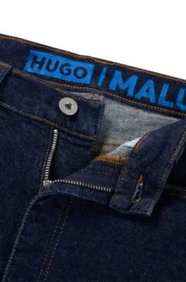 Vaqueros skinny fit en denim elástico azul oscuro