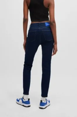Vaqueros skinny fit en denim elástico azul oscuro