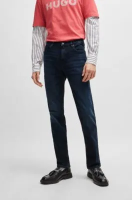 Vaqueros slim fit de denim elástico en color negro azulado