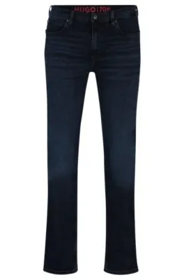 Vaqueros slim fit de denim elástico en color negro azulado