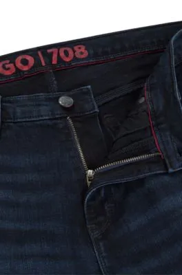 Vaqueros slim fit de denim elástico en color negro azulado