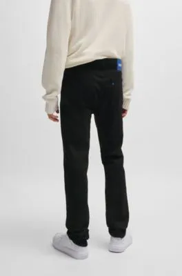 Vaqueros slim fit de denim elástico negro