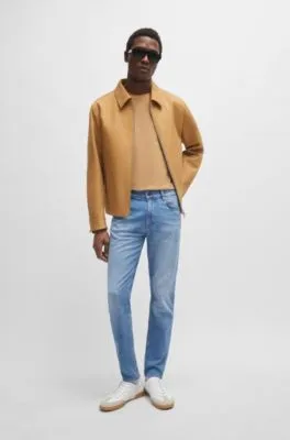 Vaqueros slim fit en denim elástico azul supersuave