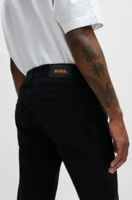 Vaqueros slim fit en denim elástico negro de gran comodidad