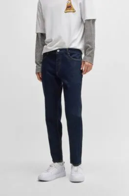 Vaqueros tapered fit de denim elástico azul oscuro