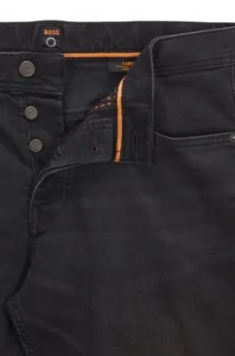 Vaqueros tapered fit de tejido vaquero superelástico en negro lavado
