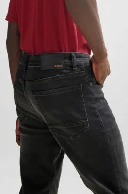 Vaqueros tapered fit de tejido vaquero supereslástico en negro