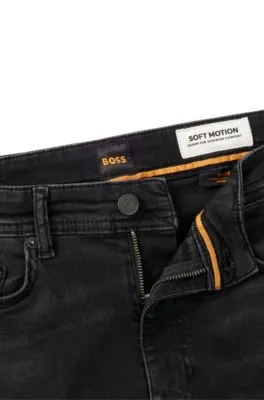 Vaqueros tapered fit de tejido vaquero supereslástico en negro