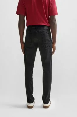 Vaqueros tapered fit de tejido vaquero supereslástico en negro